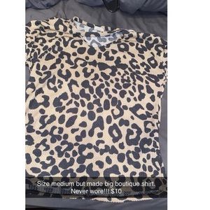 Size medium boutique top. Never worn! Fits like a large.